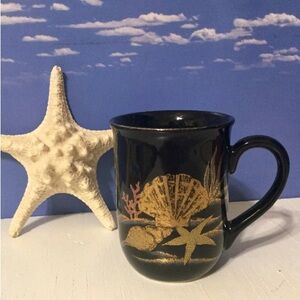 Black Mug with Gold Seashell Design